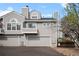 Exterior view of a home with attached garage and private balcony at 4882 W 68Th Ave # 4, Westminster, CO 80030
