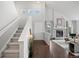 Bright foyer with staircase, hardwood floors, high ceilings, fireplace and natural light at 4882 W 68Th Ave # 4, Westminster, CO 80030