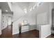 Bright and open foyer featuring hardwood floors, staircase, and high ceilings at 4882 W 68Th Ave # 4, Westminster, CO 80030