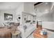 Open-concept living and dining area with hardwood floors and ample natural light at 4882 W 68Th Ave # 4, Westminster, CO 80030