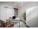 Modern office space with a barn door, a wooden desk, and a rolling leather chair at 4882 W 68Th Ave # 4, Westminster, CO 80030
