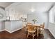 Open dining area adjacent to the kitchen, perfect for Gathering meals and entertaining at 1832 S Quintero Way, Aurora, CO 80017