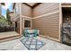 Cozy patio space featuring a stylish rug and comfortable seating, perfect for outdoor relaxation at 1832 S Quintero Way, Aurora, CO 80017