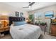 Cozy bedroom with a comfortable bed, soft lighting, and a window view, perfect for relaxation at 2846 Central Park Blvd, Denver, CO 80238