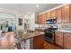 Well-equipped kitchen features stainless steel appliances, granite countertops, and an island with seating at 2846 Central Park Blvd, Denver, CO 80238