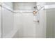 Modern tiled shower features a built-in bench and glass door, offering a spa-like experience at 2846 Central Park Blvd, Denver, CO 80238