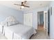 Bright bedroom with a cushioned headboard and closet, offering a peaceful retreat at 75 N Emerson St # 206, Denver, CO 80218