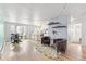 Open-concept living space with hardwood flooring, creating a versatile and stylish atmosphere at 75 N Emerson St # 206, Denver, CO 80218