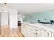 Spacious living area with an open kitchen design, perfect for entertaining and creating a seamless flow throughout the home at 75 N Emerson St # 206, Denver, CO 80218