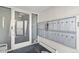 Mailroom with secure mailboxes and a glass entry door, ensuring resident privacy at 75 N Emerson St # 206, Denver, CO 80218