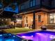 Stunning backyard with a pool, hot tub, pergola, outdoor kitchen, and a covered patio perfect for entertaining at 1051 S York St, Denver, CO 80209