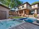 Backyard with a hot tub, swimming pool, patio area, and outdoor seating, perfect for relaxation at 1051 S York St, Denver, CO 80209