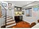 Basement featuring a stylish bar area, custom lighting, a sports team theme and a unique hide rug at 1051 S York St, Denver, CO 80209