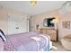 Charming bedroom with a cozy bed, dresser, and unique decor elements, perfect for relaxation at 1051 S York St, Denver, CO 80209