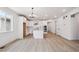 Bright kitchen with white cabinetry, stainless steel appliances, and a central island at 1121 Joseph Pl, Erie, CO 80026