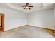 Bedroom featuring plush carpet, neutral walls, and plenty of natural light at 16350 Timber Cove St, Hudson, CO 80642
