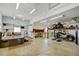 The vast garage has a hot tub, workbenches, and a vehicle lift at 16350 Timber Cove St, Hudson, CO 80642