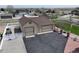 Detached two-car garage with a spacious driveway and fenced in area at 16350 Timber Cove St, Hudson, CO 80642