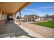 Attached garage with a pathway, additional parking, and well-kept landscaping at 16350 Timber Cove St, Hudson, CO 80642