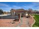 Detached garage with mature trees, manicured landscaping, and plenty of parking space at 16350 Timber Cove St, Hudson, CO 80642