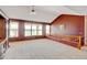 Spacious living room with vaulted ceiling and multiple windows offering natural light at 16350 Timber Cove St, Hudson, CO 80642