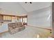 Open-concept living area with a view of the kitchen and dining room at 16350 Timber Cove St, Hudson, CO 80642