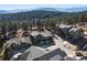 Aerial view of townhomes nestled in a mountain community at 3897 Piney Grove St, Evergreen, CO 80439