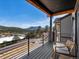 Private deck with mountain views and comfortable seating at 3897 Piney Grove St, Evergreen, CO 80439