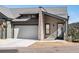 Contemporary townhome with attached two-car garage at 3897 Piney Grove St, Evergreen, CO 80439