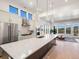 Modern kitchen with island and stainless steel appliances at 3897 Piney Grove St, Evergreen, CO 80439
