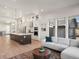 Open concept living room and kitchen with mountain views at 3897 Piney Grove St, Evergreen, CO 80439