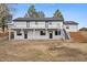 Spacious backyard featuring a newly constructed two-story deck, fresh paint, and walkout basement at 11840 Elkhorn Dr, Franktown, CO 80116