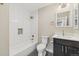 The bathroom showcases a tub-shower combo with white subway tile, adding a classic touch to modern living at 11840 Elkhorn Dr, Franktown, CO 80116