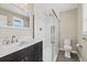 Modern bathroom features glass-enclosed shower, sleek vanity, and stylish fixtures for a spa-like experience at 11840 Elkhorn Dr, Franktown, CO 80116