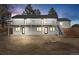 Two-story home with a walkout basement, deck, and stairs leading to the backyard at 11840 Elkhorn Dr, Franktown, CO 80116