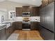 Modern kitchen featuring stainless steel appliances, and ample counter space at 11840 Elkhorn Dr, Franktown, CO 80116