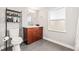 Bathroom with a modern vanity and shelving unit at 4120 S Lincoln S St, Englewood, CO 80113