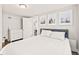 Bedroom with a dresser and doorway to another room at 4120 S Lincoln S St, Englewood, CO 80113