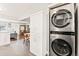 Convenient laundry area near the kitchen with stackable washer and dryer at 4120 S Lincoln S St, Englewood, CO 80113
