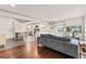 Open concept living room with modern furnishings, hardwood floors, and ample natural light at 4120 S Lincoln S St, Englewood, CO 80113