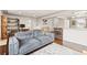 Open floorplan with hardwood floors, a comfortable couch, and stylish decor at 4120 S Lincoln S St, Englewood, CO 80113