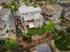 Aerial view of a backyard featuring a patio, seating area, garden beds, and privacy fence at 4738 Colorado River Dr, Firestone, CO 80504