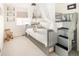 Comfortable bedroom featuring a unique bunk bed with stairs, whimsical decor, and a cozy rocking chair at 4738 Colorado River Dr, Firestone, CO 80504