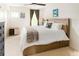 Comfortable bedroom with a large bed, soft carpet, and bright natural light at 4738 Colorado River Dr, Firestone, CO 80504