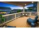 Second story deck with outdoor furniture with views of the neighborhood at 4738 Colorado River Dr, Firestone, CO 80504