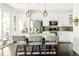 Modern kitchen island with granite countertops and stainless steel appliances at 4738 Colorado River Dr, Firestone, CO 80504