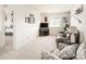 Cozy living room with neutral tones, plush seating, and view to the Main Bedroom at 4738 Colorado River Dr, Firestone, CO 80504