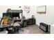Functional home office with a spacious desk, comfortable chair, ample storage, and modern electronics at 4738 Colorado River Dr, Firestone, CO 80504