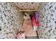 Unique playroom with whimsical wallpaper, colorful decor, and a cozy play area at 4738 Colorado River Dr, Firestone, CO 80504