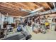 Unfinished basement with exposed ceiling, lighting, and equipment at 20058 E Dartmouth Dr, Aurora, CO 80013